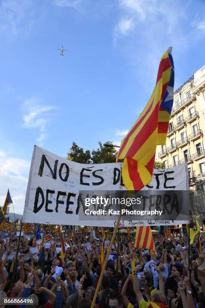 Protesters gather in the city centre to demonstrate against the Spanish federal government's move to suspend Catalonian autonomy on October 21, 2017...