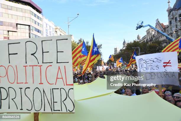 Protesters gather in the city centre to demonstrate against the Spanish federal government's move to suspend Catalonian autonomy on October 21, 2017...