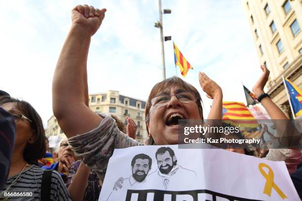 Protesters gather in the city centre to demonstrate against the Spanish federal government's move to suspend Catalonian autonomy on October 21, 2017...