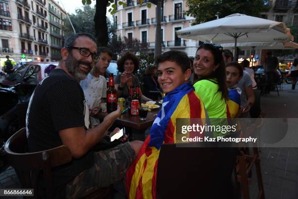 Protesters gather in the city centre to demonstrate against the Spanish federal government's move to suspend Catalonian autonomy on October 21, 2017...