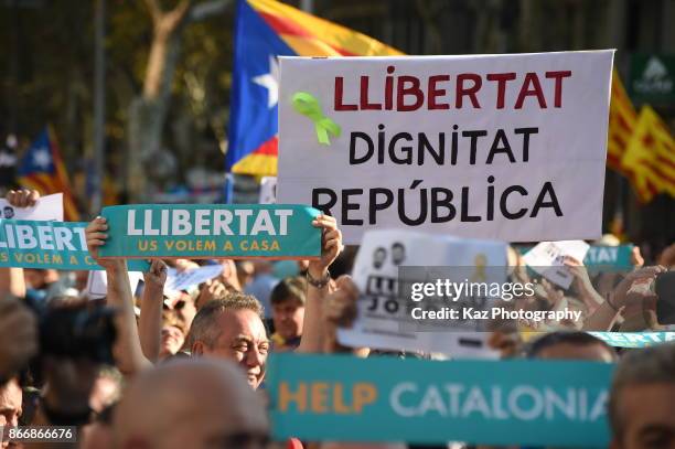 Protesters gather in the city centre to demonstrate against the Spanish federal government's move to suspend Catalonian autonomy on October 21, 2017...