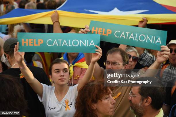 Protesters gather in the city centre to demonstrate against the Spanish federal government's move to suspend Catalonian autonomy on October 21, 2017...