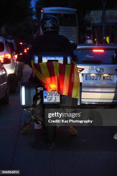 Protesters gather in the city centre to demonstrate against the Spanish federal government's move to suspend Catalonian autonomy on October 21, 2017...