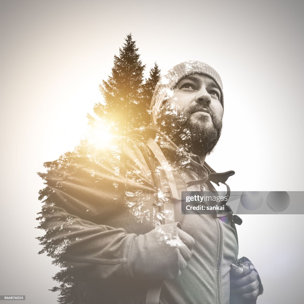 Traveler walking alone in the mountains