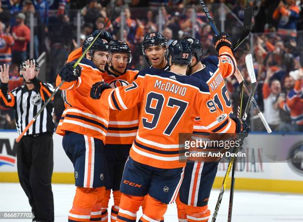 Leon Draisaitl, Matthew Benning, Darnell Nurse, Patrick Maroon and Connor McDavid of the Edmonton Oilers celebrate after a goal during the game...
