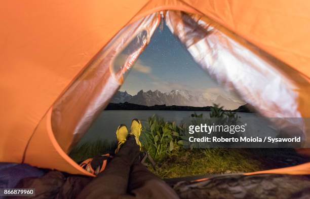 tent at lacs de cheserys, france - lake chesery stockfoto's en -beelden