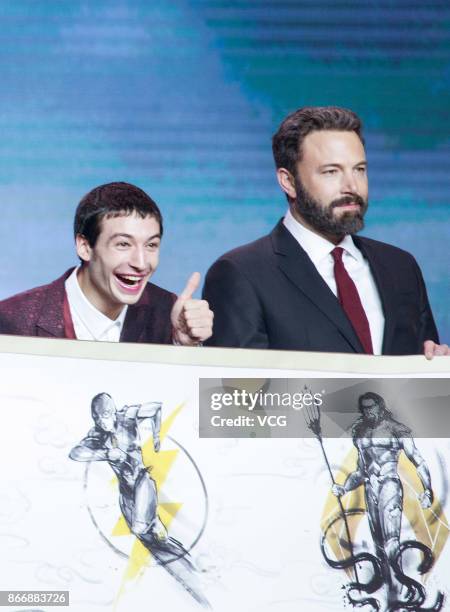 Actors Ezra Miller and Ben Affleck attend 'Justice League' premiere at 798 Art Zone on October 26, 2017 in Beijing, China.