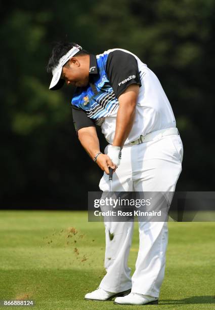 Kiradech Aphibarnrat of Thailand plays a shot on the ninth hole during the second round of the WGC - HSBC Champions at Sheshan International Golf...