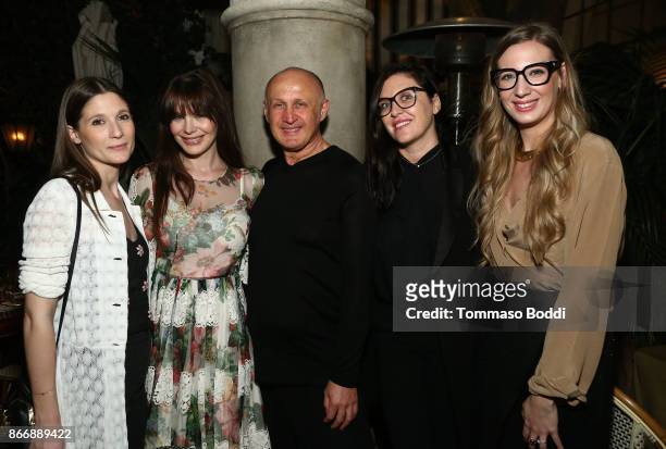 Benedetta Finocchi, Lucila Sola, Gisella Marengo and Arianna Casadei attend a party hosted by designer Cesare Casadei, center, at Chateau Marmont on...
