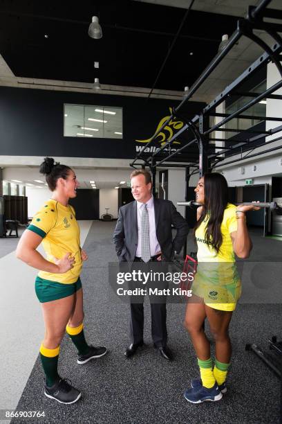 Bill Pulver speaks to Rugby Australia athletes Mollie Gray and Mahalia Murphy during the opening of the Rugby Australia Building on October 27, 2017...