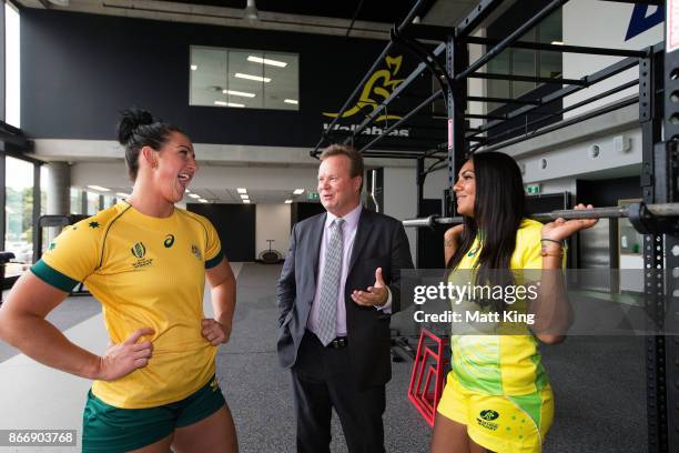 Bill Pulver speaks to Rugby Australia athletes Mollie Gray and Mahalia Murphy during the opening of the Rugby Australia Building on October 27, 2017...