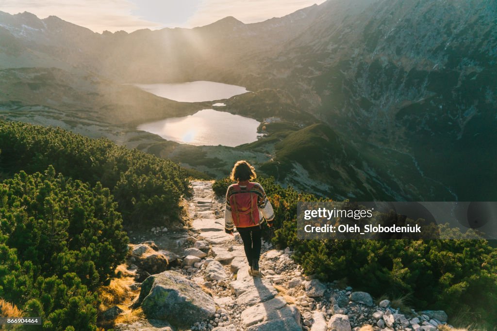 Woman walking   near the lake in Tatra  mountains