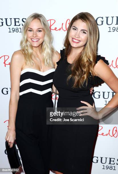 Abigail Klein and Brooke Peoples attend GUESS 1981 Men's Fragrance Launch hosted by RedOne at Poppy on October 26, 2017 in Los Angeles, California.