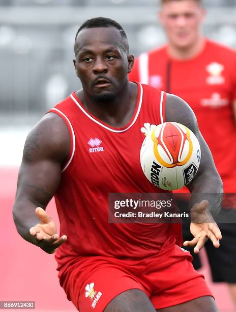 Phil Joseph passes the ball during a Wales Rugby League World Cup captain's run at the Oil Search National Football Stadium on October 27, 2017 in...