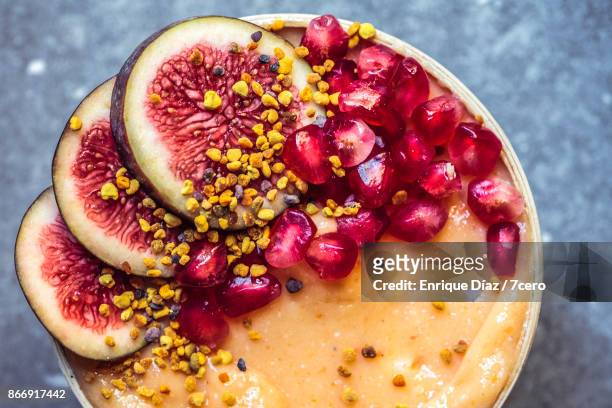 orange persimmon ice cream close up - smoothie bowl fotografías e imágenes de stock