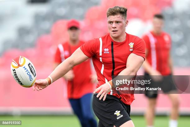 Morgan Knowles passes the ball during a Wales Rugby League World Cup captain's run at the Oil Search National Football Stadium on October 27, 2017 in...