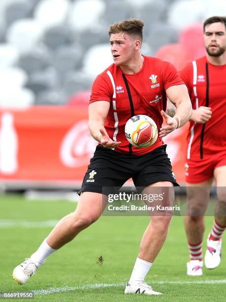 Morgan Knowles passes the ball during a Wales Rugby League World Cup captain's run at the Oil Search National Football Stadium on October 27, 2017 in...