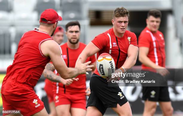 Morgan Knowles passes the ball during a Wales Rugby League World Cup captain's run at the Oil Search National Football Stadium on October 27, 2017 in...