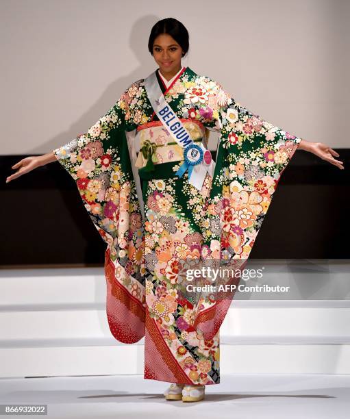 Miss Belgium, Virginie Philippot poses in a traditonal Japanese Kimono during the 57th Miss International Beauty Pageant press conference in Tokyo on...