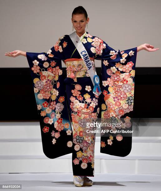 Miss Canada, Marta Magdalena Stepien poses in a traditonal Japanese Kimono during the 57th Miss International Beauty Pageant press conference in...