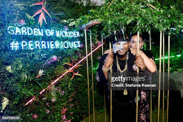 Usher and Grace Miguel attend Perrier-Jouet Presents Garden of Wonder with Simon Hammerstein on October 26, 2017 in West Hollywood, California.