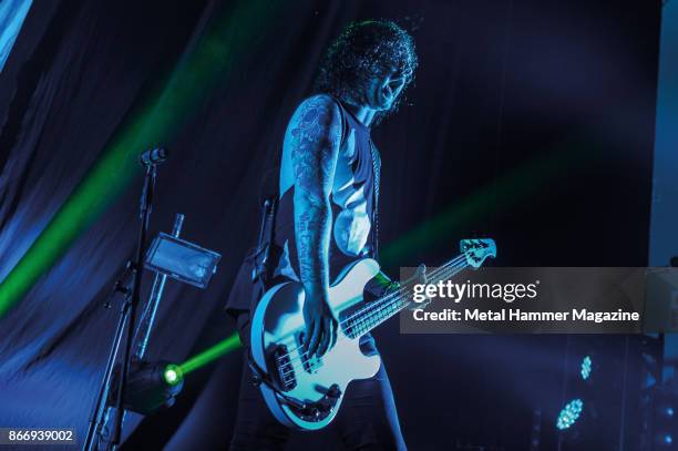 Bassist Sam Bettley of English metalcore group Asking Alexandria performing live on stage at the O2 Academy Brixton in London, on April 8, 2017.