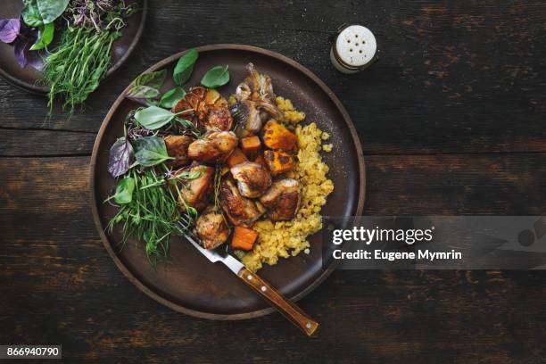 roasted chicken with pumpkin and lentils - wood dish stock pictures, royalty-free photos & images