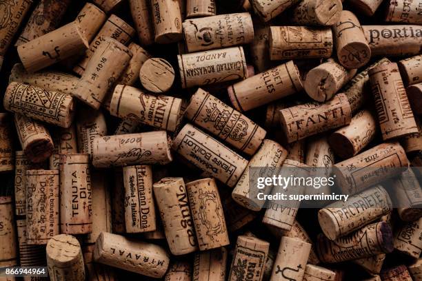 wine corks with brand names and logos. - wine cork stock pictures, royalty-free photos & images