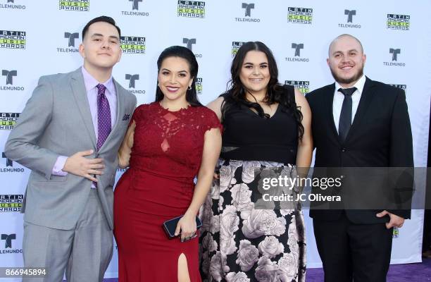 Tv personalities Johnny Lopez, Jenicka Lopez, Jacqie Lopez, and Michael Marin of the reality tv show 'The Riveras' attend The 2017 Latin American...