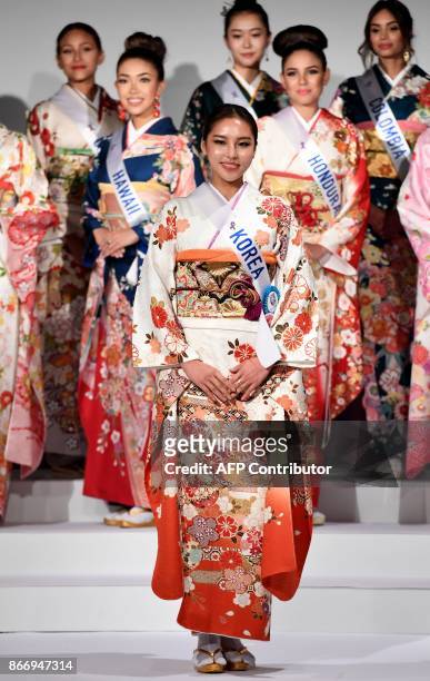 Miss Korea, Nam Seung-Woo poses in traditional Japanese Kimono during the 57th Miss International Beauty Pageant press conference in Tokyo on October...