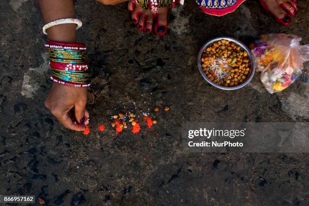 Preparation before beginning the rituals of worshipping the sun god, for the well being of family and friends in Kolkata, West Bengal on October 26,...