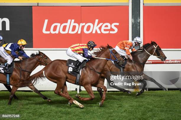 Sam's Image ridden by Luke Nolen wins the Mitchelton Wines Handicap at Moonee Valley Racecourse on October 27, 2017 in Moonee Ponds, Australia.