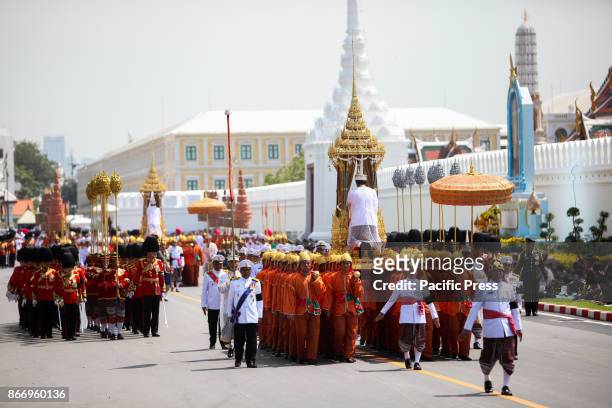 Procession to transfer His Majesty the late King Bhumibol Adulyadejs royal relics and ashes from the royal crematorium in Sanam Luang to the Grand...