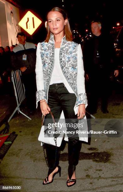 Nicolas Ghesquiere and Alicia Vikander are seen arriving at the Volez, Voguez, Voyagez - Louis Vuitton Exhibition Opening on October 26, 2017 in New...