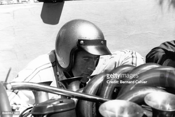 Jack Brabham, Brabham-Repco BT24, Grand Prix of France, Bugatti Circuit, Le Mans, 02 July 1967. Jack Brabham examining the Repco 620 3.0 V8 engine of...