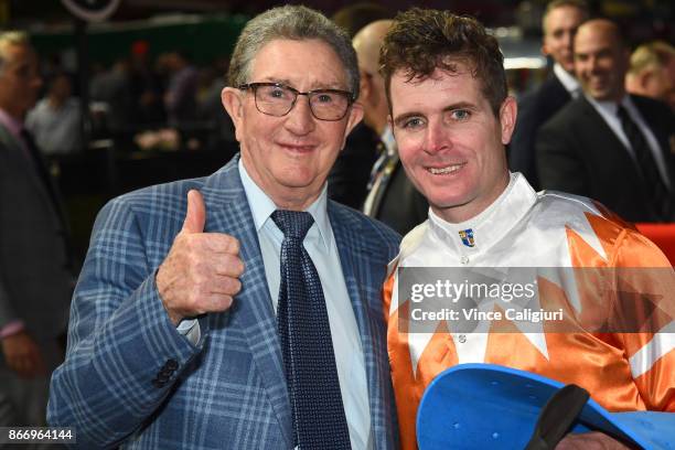Luke Nolen poses with trainer Peter Morgan after riding Sam's Image to win Race 4, during Manikato Stakes Night at Moonee Valley Racecourse on...