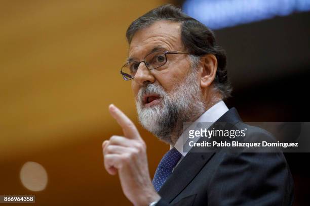 Spain's Prime Minsiter Mariano Rajoy speaks during a plenary session to approve article 155 of the Spanish Constitution at the Spanish Senate on...