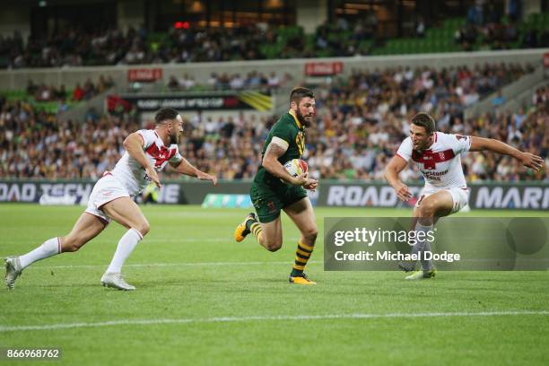 Matt Gillett of the Kangaroos scores a try during the 2017 Rugby League World Cup match between the Australian Kangaroos and England at AAMI Park on...