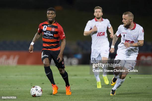 Rolieny Bonevacia of the Wanderers gets away from Adelaide's Daniel Adlung during the Semi Final FFA Cup match between the Western Sydney Wanderers...