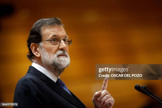 Spain's Prime Minister Mariano Rajoy gives a speech during a session of the Upper House of Parliament in Madrid on October 27, 2017. Spanish Prime...