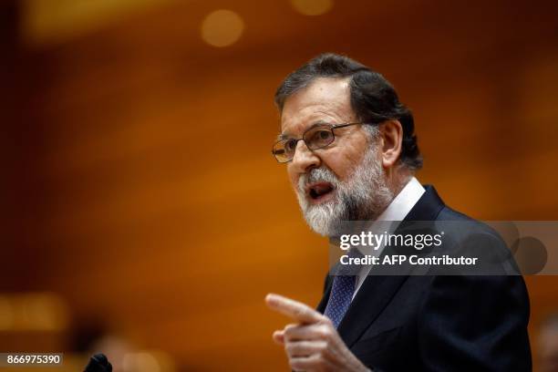 Spain's Prime Minister Mariano Rajoy gives a speech during a session of the Upper House of Parliament in Madrid on October 27, 2017. The central...