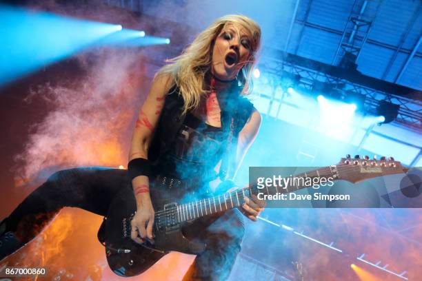 Musician Nita Strauss performs with Alice Cooper at The Trusts Arena on October 27, 2017 in Auckland, New Zealand.