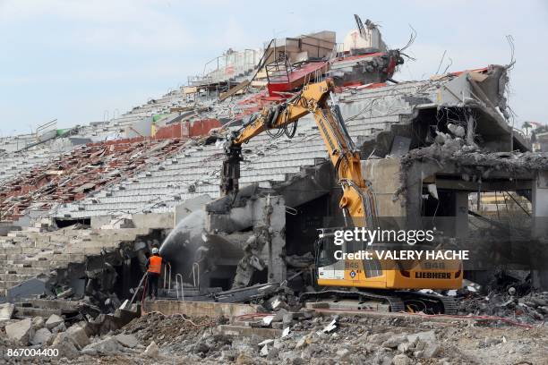 Workers work on the destruction of the Ray stadium on October 27, 2017 in Nice, southeastern France.