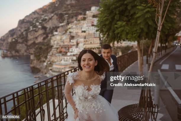 romantic moment in a romantic place... - positano italy stock pictures, royalty-free photos & images