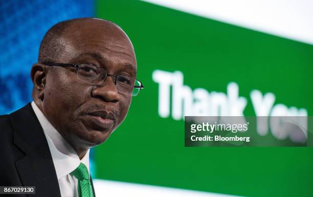 Godwin Emefiele, governor of Nigeria's central bank, speaks during the Nigeria Capital Markets and Banking Forum in London, U.K., on Friday, Oct. 27,...