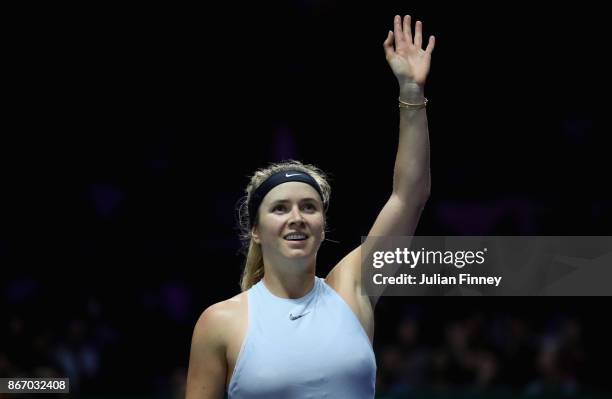 Elina Svitolina of Ukraine celebrates victory in her singles match against Simona Halep of Romania during day 6 of the BNP Paribas WTA Finals...