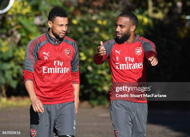 Francis Coquelin and Alex Lacazette of Arsenal before a training session at London Colney on October 27, 2017 in St Albans, England.