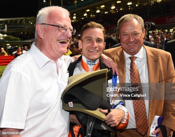 Jockey Luke Currie and trainer Tony McEvoy are all smiles after Hey Doc won Race 7, Ladbrokes Manikato Stakes during Manikato Stakes Night at Moonee...