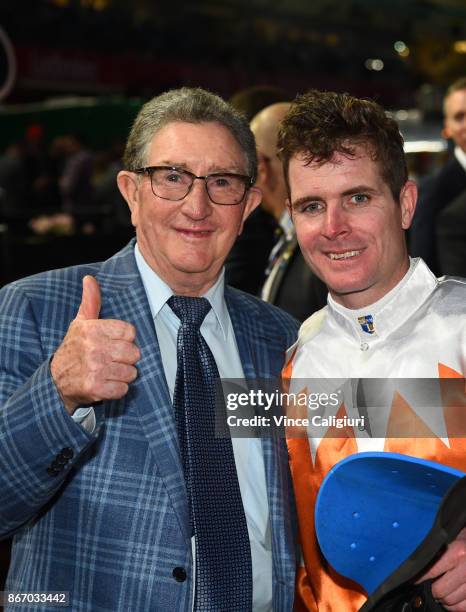 Luke Nolen poses with trainer Peter Morgan after riding Sam's Image to win Race 4, during Manikato Stakes Night at Moonee Valley Racecourse on...