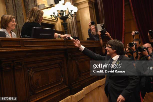 Catalan President Carles Puigdemont casts his vote for independence from Spain at the Catalan Government building Generalitat de Catalunya on October...
